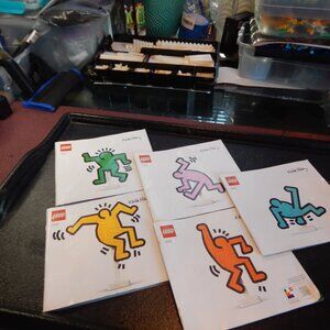 Keith Haring Lego Dancing Figure's Building Instruction Books.